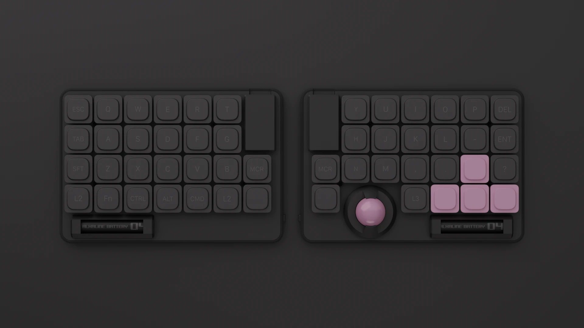 ZEN — 黒いキーキャップとピンクのアクセントキー、右手側にトラックボールを備えた左右分割キーボード
